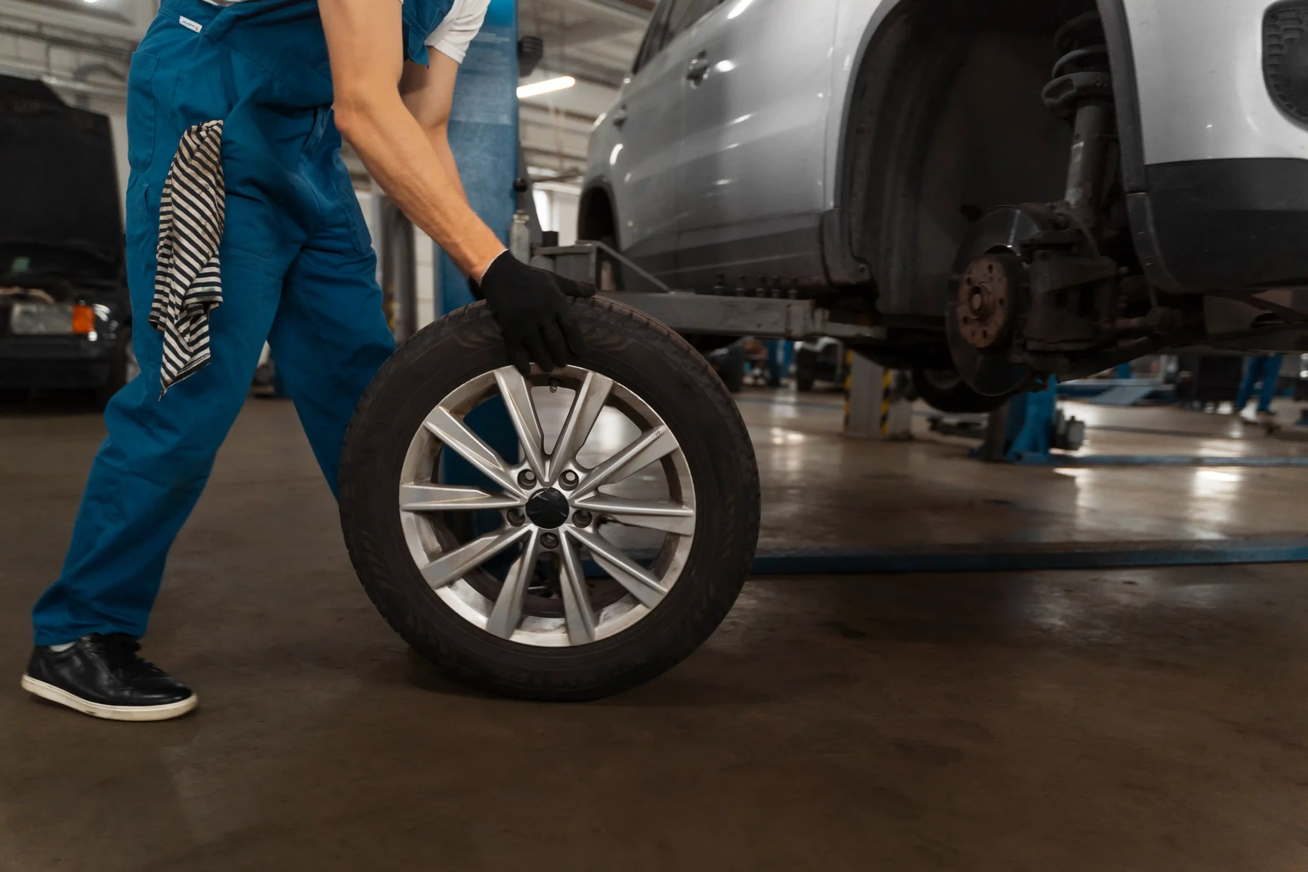 mechanic-working-shop-car